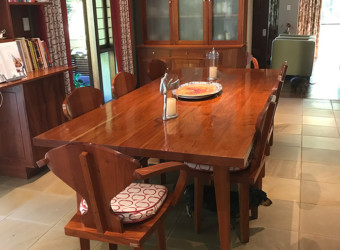 Handmade solid-wooden dining room table and chairs and cabinets